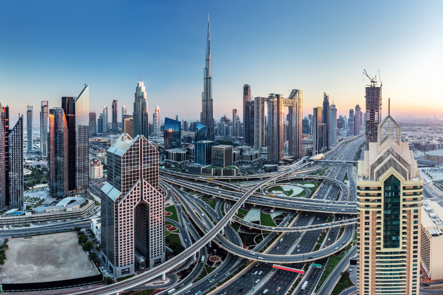 Downtown Dubai skyline with Burj Khalifa at sunset